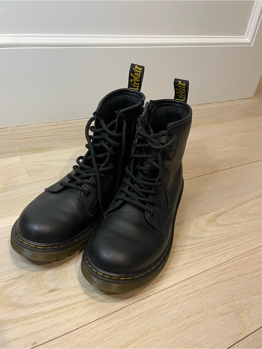 Dr. Martens Black Leather Lace-Up Combat Boots with Yellow Welt Stitching